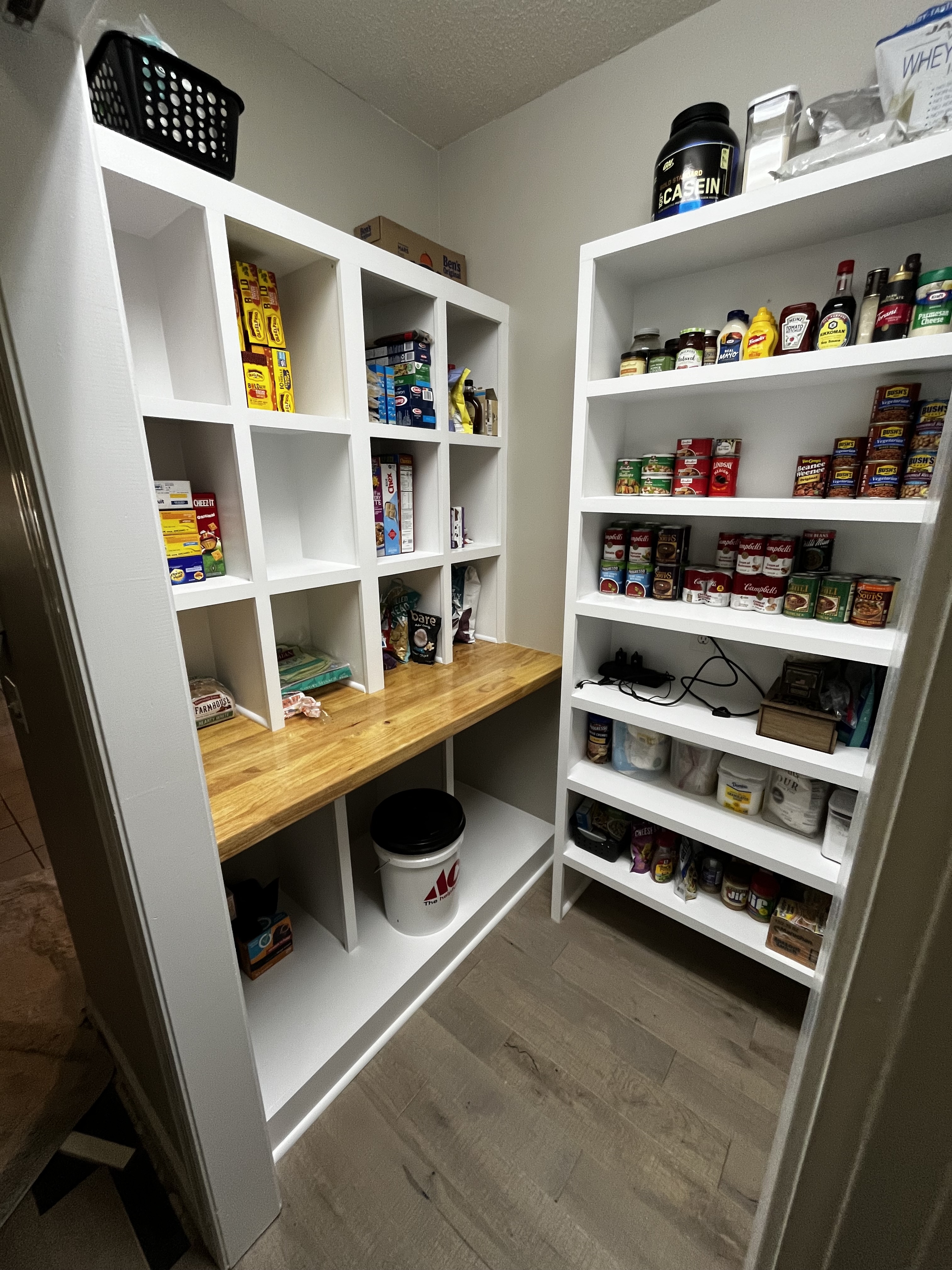 Custom pantry shelving and storage workspace