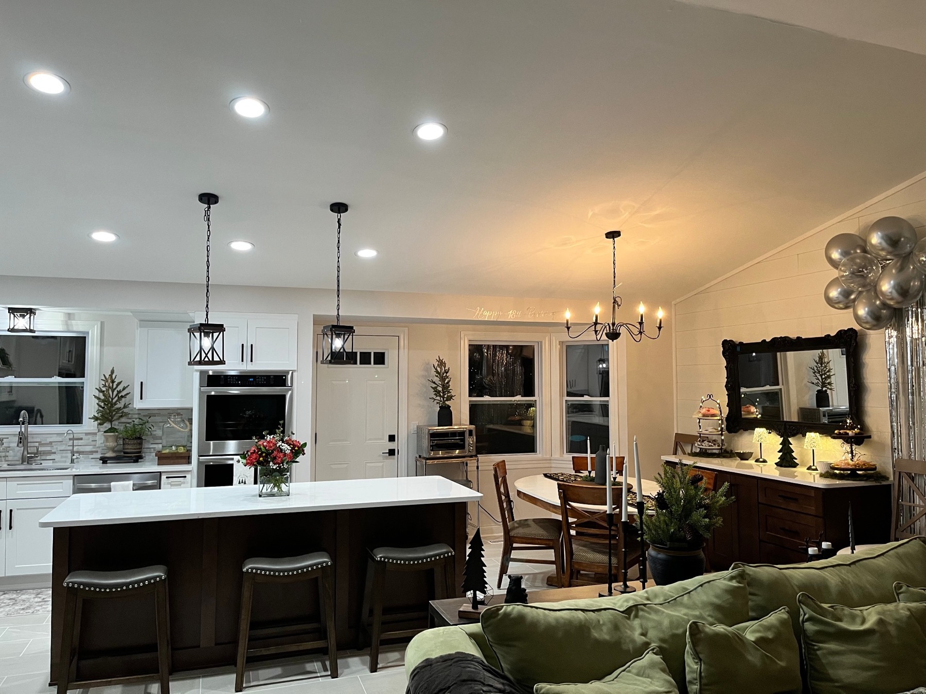 Complete kitchen remodel with cabinets, counters, lighting, doors, and windows